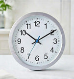 Modern White Wall Clock with Blue Second Hand
