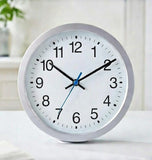 Modern White Wall Clock with Blue Second Hand